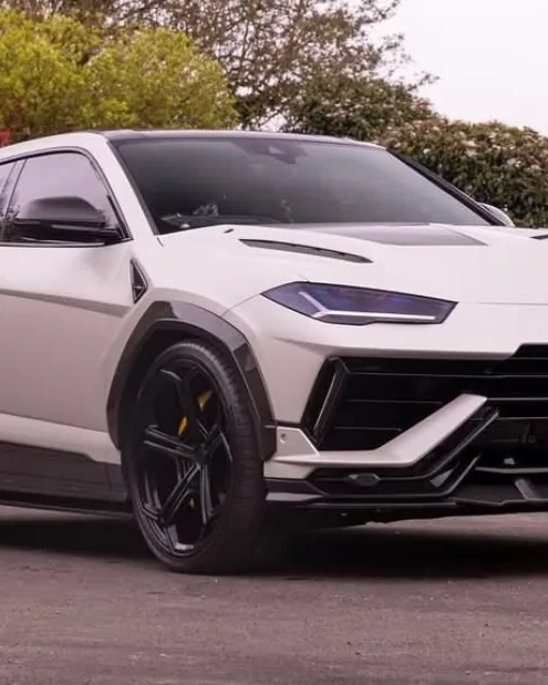 Grey Lamborghini Urus on a driveway